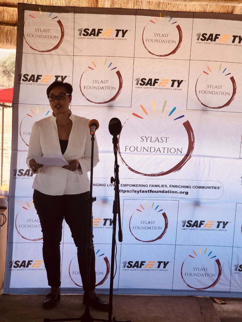 Woman speaking at Sylast Foundation Launch Event